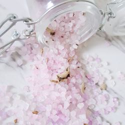 High angle view of pink flower in glass container