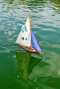 High angle view of sailboat floating on lake