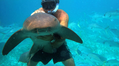 Man swimming in sea