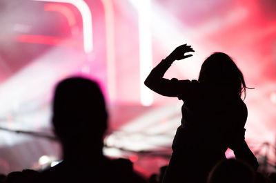 Silhouette people enjoying at music concert