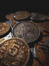 High angle view of coins on table