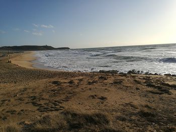 Scenic view of sea against clear sky