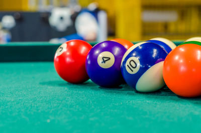Multi colored balls on pool table