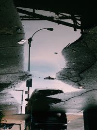 Cars on road against sky