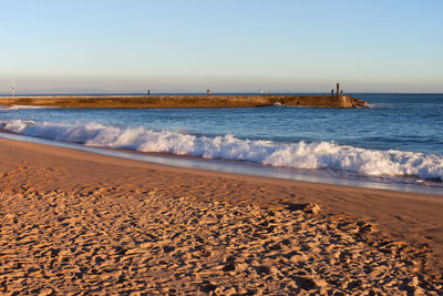 Scenic view of sea against clear sky