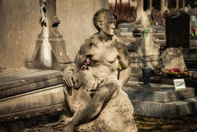 Statue of buddha in cemetery