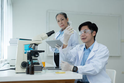 Portrait of female scientist working in laboratory