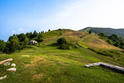 Stone shelter among the green meadows on the mountains above revine lago treviso veneto italy