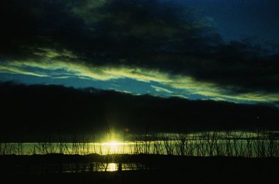 Scenic view of landscape against cloudy sky