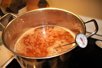 Close-up of boiling wort on a stove 