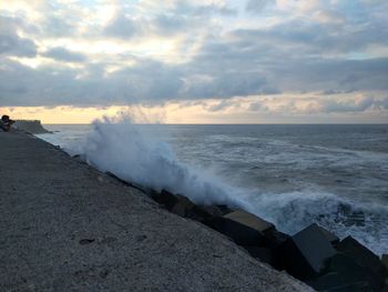 Scenic view of sea against sky during sunset