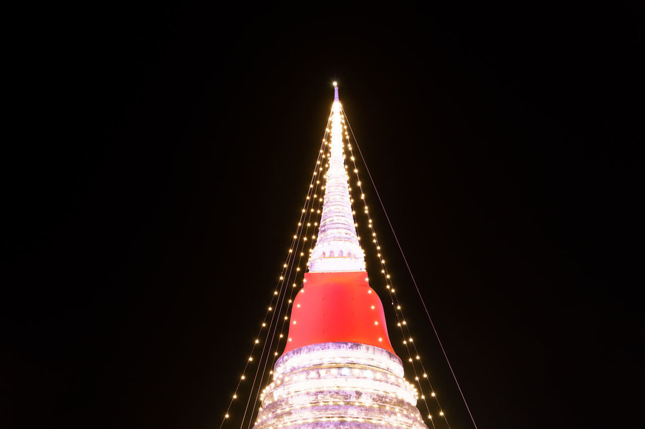 LOW ANGLE VIEW OF ILLUMINATED SKYSCRAPER