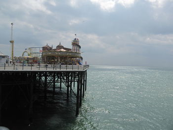 Brighton pier over sea against sky