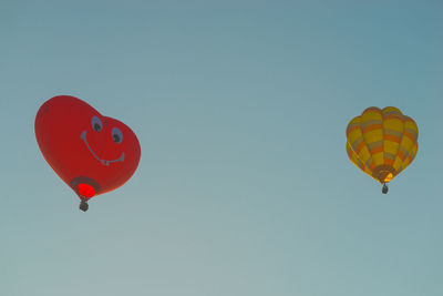 Low angle view of hot air balloon against clear sky