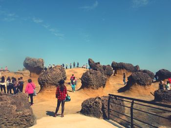 Group of people on rock