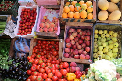 Stack of fruits for sale at market stall