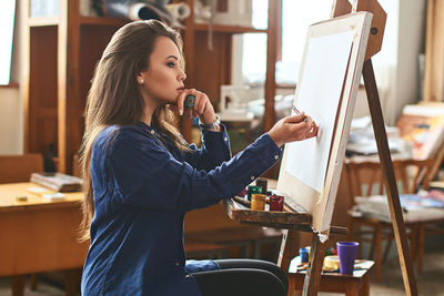 Young woman using mobile phone