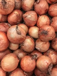 Full frame shot of onions for sale at market stall