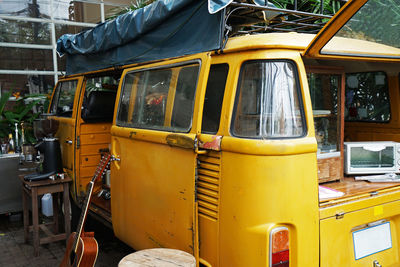Interior design and decoration of coffee cafe decorated with yellow van car