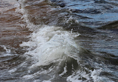 Sea waves splashing on beach