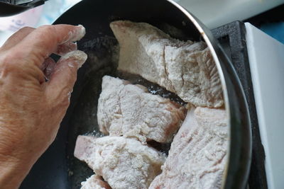 Close-up of person preparing food