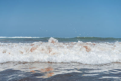 Sea-level photo of the ocean's white foam