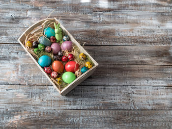 High angle view of multi colored pencils on wood