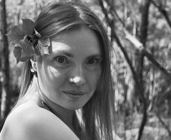 Close-up portrait of a smiling young woman