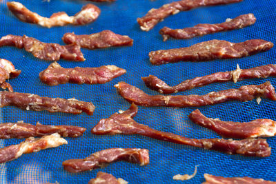 High angle view of food on blue background