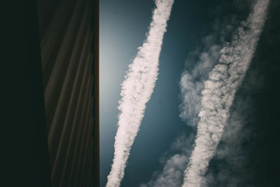 Aerial view of vapor trails in sky