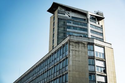 Low angle view of modern building against clear sky