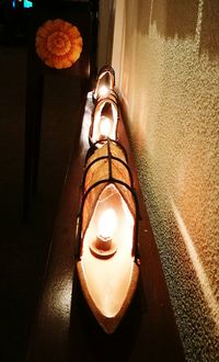 Low angle view of illuminated light bulb