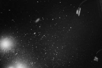 Low angle view of stars in sky at night