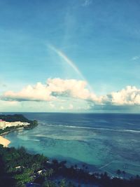 Scenic view of sea against blue sky