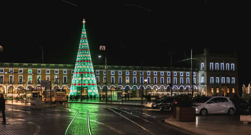 Illuminated city buildings at night