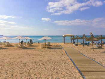 Scenic view of beach against sky