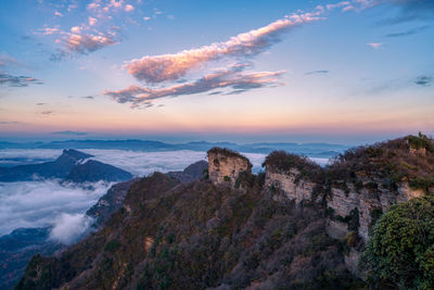 Scenic view of mountains against sky during sunset