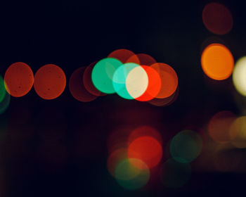 Defocused image of illuminated lights at night