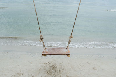 High angle view of swing on beach