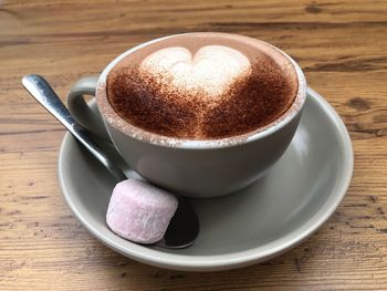 Close-up of coffee in cup on table