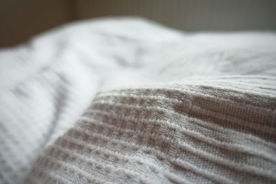 Close-up of bed on bed
