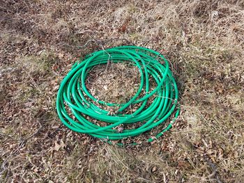 High angle view of blue container on field