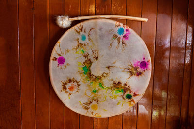 High angle view of flowers on wooden table