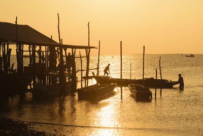 Scenic view of sea against clear sky during sunset