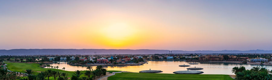 High angle view of townscape against sky during sunset