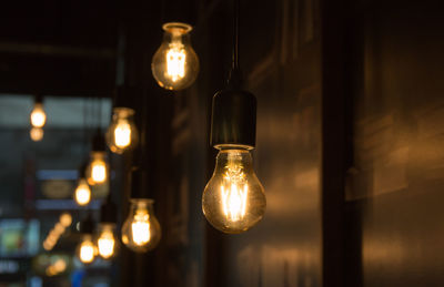 Close-up of illuminated light bulb