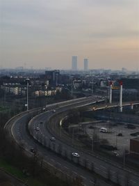 High angle view of cityscape against sky at night