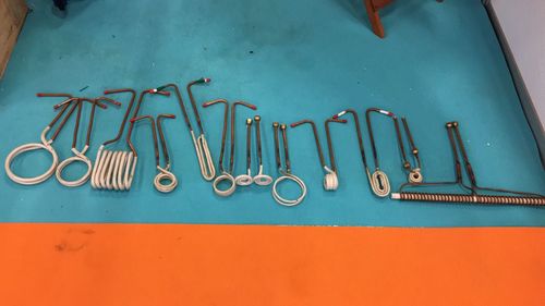 High angle view of various hooks on table