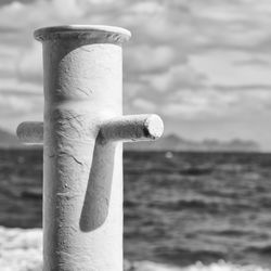 Close-up of wooden post in sea