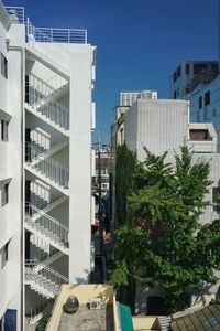 Modern buildings against clear sky